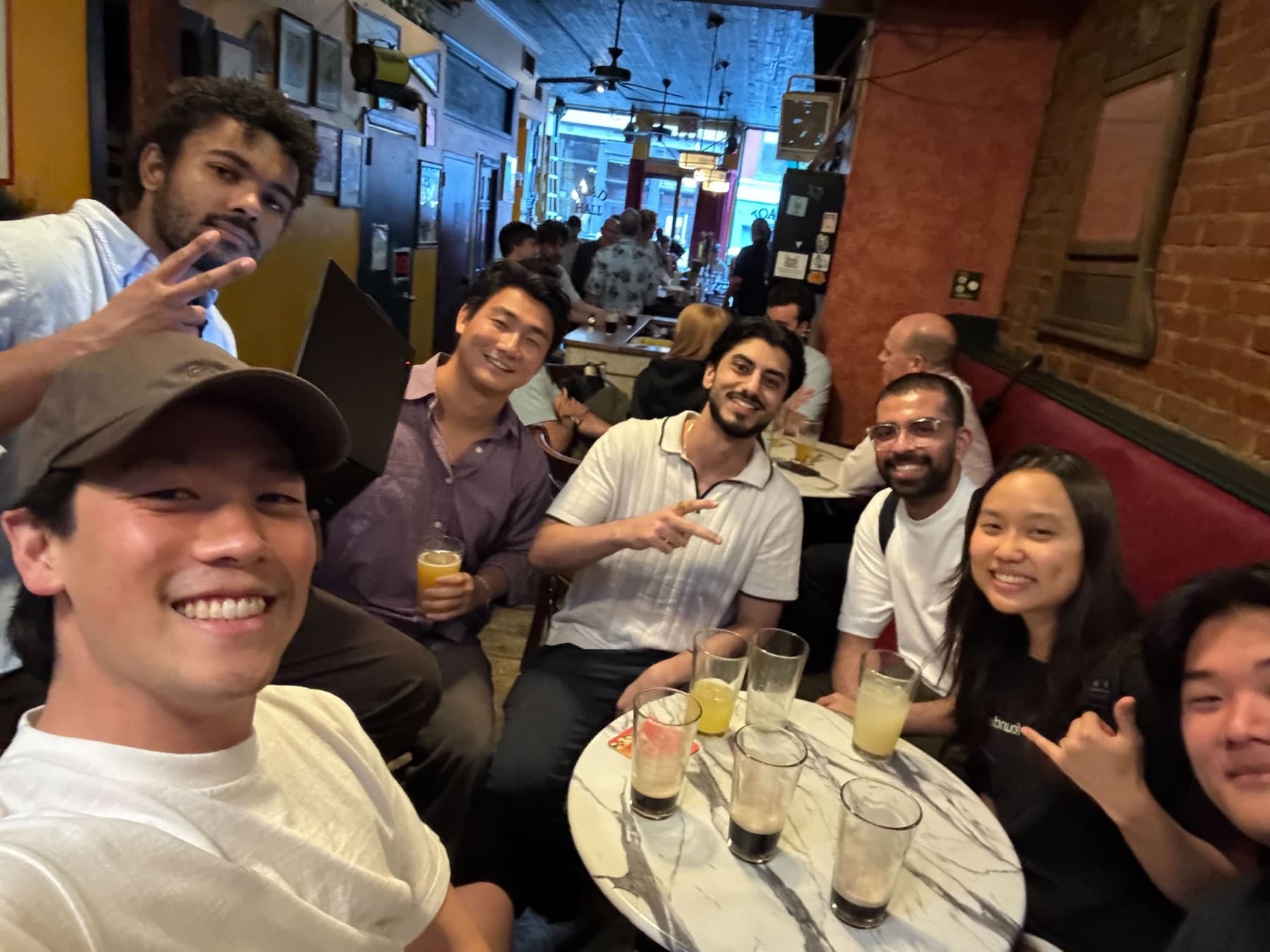 Zingage team at an after-work table in Soho